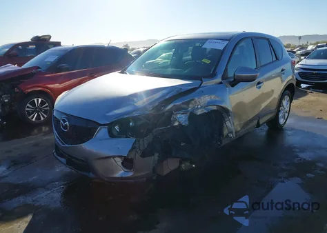 2013 Mazda Cx-5 Grand Touring z USA, uszkodzony, nr VIN JM3KE4DE8D0156887